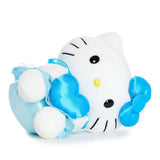 Hello Kitty is holding blue heart and blue bow and dress on a white background