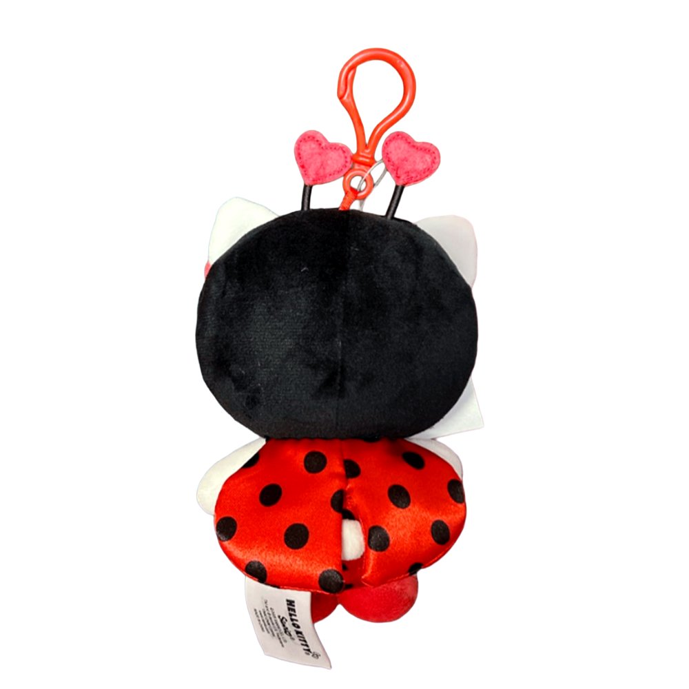 An officially licensed Hello Kitty plush keychain featuring Hello Kitty in a red ladybug costume with black polka dots. She is wearing a black hood with two red heart-shaped antennae and her signature red bow.
