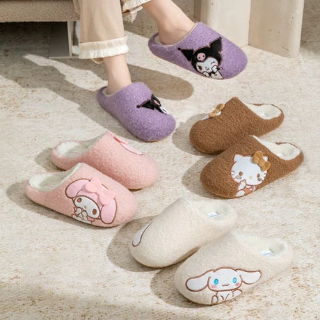 A officially licensed Sanrio collection of sherpa fleece Hello Kitty, Cinnamoroll, My Melody, and Kuromi slippers with a white fleece interior, featuring a side-profile of each character embroidery.