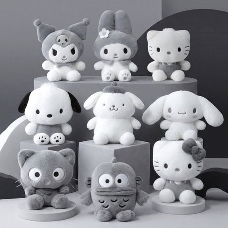 An officially licensed Sanrio Hello Kitty, Dear Daniel, My Melody, Cinnamoroll, Kuromi, Pompompurin, Pochacco, Chococat, and Hangyodon plush dolls each dressed in their iconic outfits in monochrom white and gray color