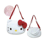 An officially licensed Sanrio Hello Kitty white plush shoulder bag with a red strap and signature red bow, shown from both the front and back view alongside a close-up of its pink patterned interior lining
