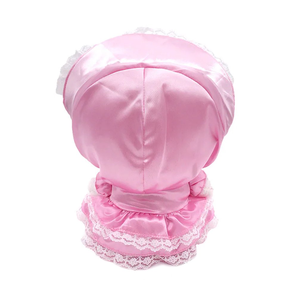 An officially licensed Sanrio Hello Kitty plush doll wearing an ornate pink satin Lolita-style dress with white lace trim, a matching oversized lace bonnet, and shimmering metallic pink shoes.