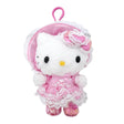 An officially licensed Sanrio Hello Kitty plush keychain wearing a pink Lolita-style dress and bonnet with white lace trim, featuring a pink heart bow and metallic pink shoes