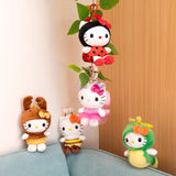 A collection of six officially licensed Hello Kitty plush keychains dressed as garden bugs, including a ladybug, bumblebee, butterfly, ant, beetle, and caterpillar, each with a matching colored lobster clasp.