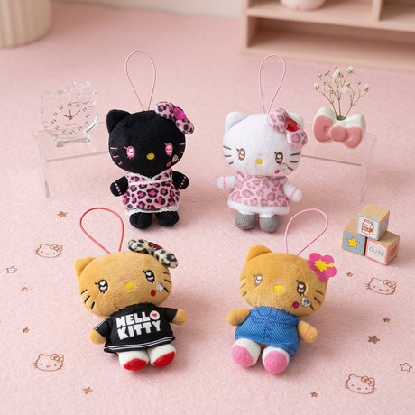 An officially licensed Sanrio collection of plush keychains of Hello Kitty styled in "Gal" fashion, featuring heart-shaped eyes and a small elastic loop for hanging.