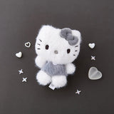 This Officially licensed Sanrio fluffy Hello Kitty plush is the perfect blend of "kawaii" culture and modern, neutral aesthetics. Features Hello Kitty’s iconic silhouette, complete with her signature bow and whiskers in a unique charcoal grey and snowy white colorway.