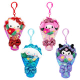 An officially licensed Sanrio collection of Hello Kitty, My Melody, Cinnamoroll, Kuromi plush bouquet keychains, each featuring a plush character head and colorful flowers wrapped in shimmering iridescent fabric. The bouquet is finished with a large, sparkling sequined bow at the base for a festive touch.