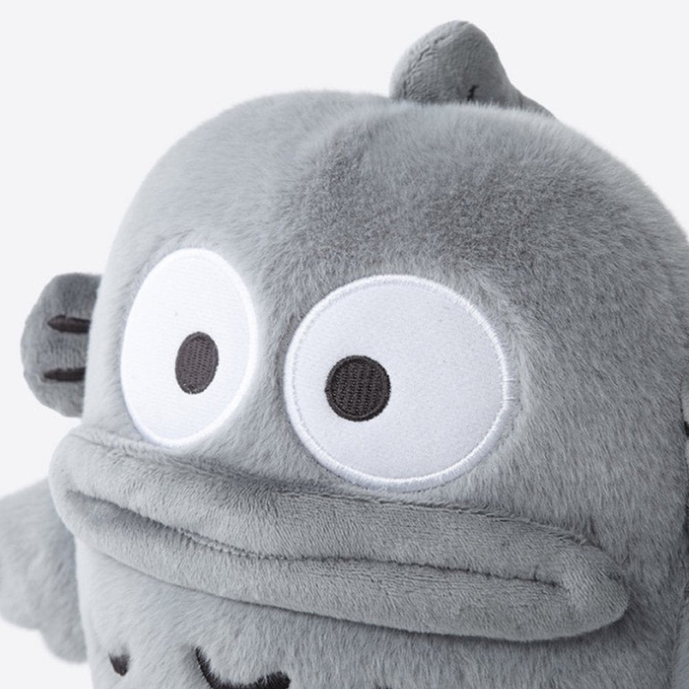 An officially licensed Sanrio Hello Kitty, Dear Daniel, My Melody, Cinnamoroll, Kuromi, Pompompurin, Pochacco, Chococat, and Hangyodon plush dolls each dressed in their iconic outfits in monochrom white and gray color