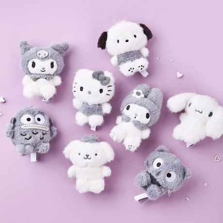 An officially licensed collection of Sanrio character plush toys, all in a monochrome scheme. The characters include Hello Kitty, Kuromi, Pochacco, My Melody, Cinnamoroll, Chococat, Pompompurin, and Hangyodon.