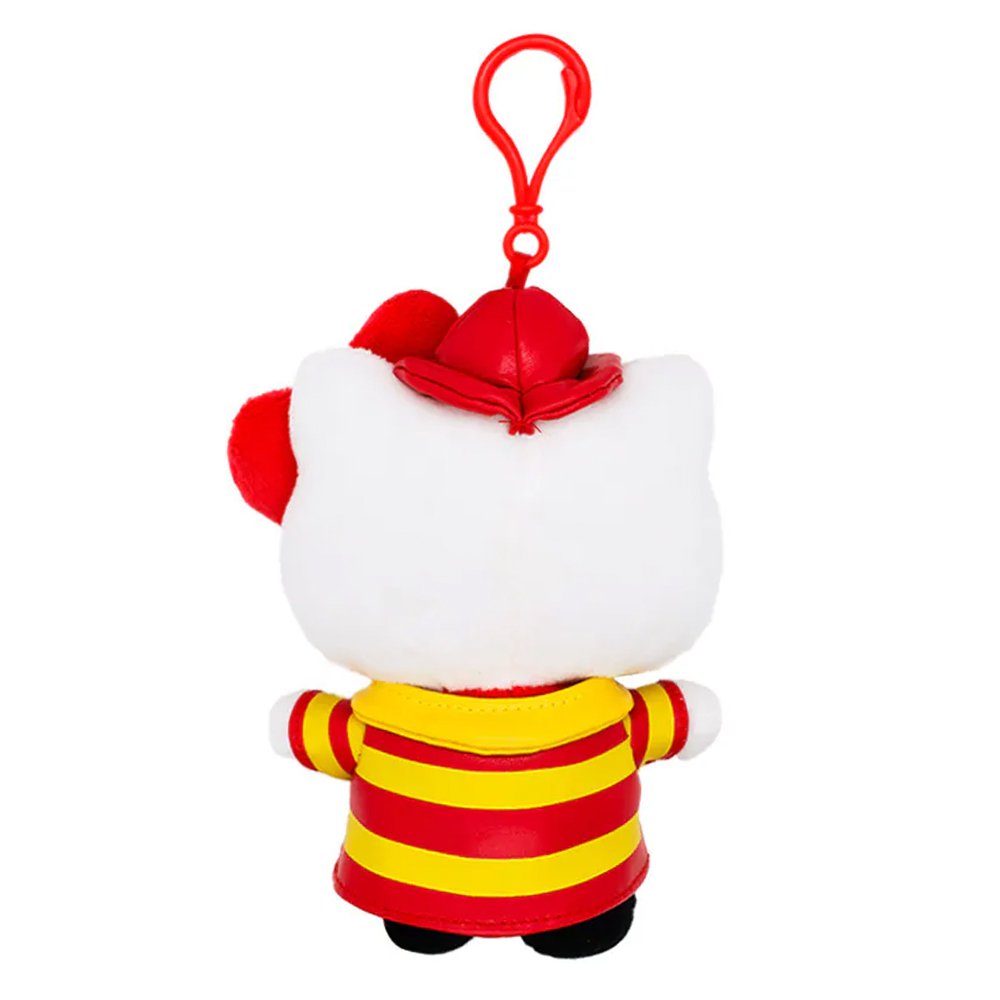 An officially licensed Hello Kitty plush keychain dressed as a firefighter, featuring a red and yellow striped uniform, a red fire helmet with a gold badge, her signature red bow, and a red plastic clip.