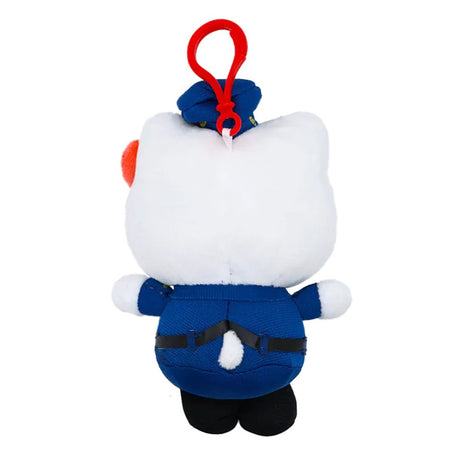 An officially licensed Hello Kitty plush clip-on dressed in a blue police officer uniform with a matching hat, a golden badge, and a red bow, featuring a red plastic attachment clip.