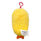An officially licensed Sanrio plush keychain featuring Hello Kitty dressed as a piece of tempura shrimp with a fuzzy yellow body and orange tails. The plush includes her iconic red bow and a matching red plastic attachment clip.