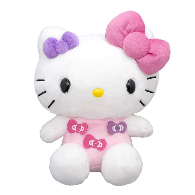 Officially licensed Hello Kitty plush toy wearing a pink outfit with bow patches, featuring a small purple bow and a large pink plush bow on her head.