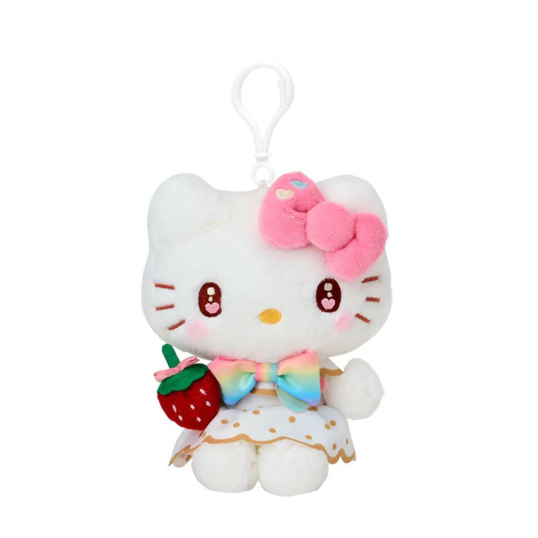 Officially licensed by Sanrio Hello Kitty dressed in elegant white outfits with gold polka dots and vibrant rainbow bows, this large cast of beloved she is holding a velvet strawberry and features detailed embroidered heart accents in eyes their eyes. Perfect for adding a nautical touch of kawaii style to your bag, keys, or backpack.