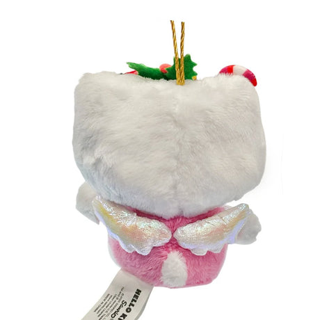 This exclusive Hello Kitty x Tokidoki collaboration is perfect for the holiday season. Her head opens to reveal a collection of mini plush toys including a snowman with red and green buttons, green holly leaves with red berries and candy cane. Hello Kitty herself features the signature Tokidoki heart and crossbones skull bow accent in her iconic red bow, along with soft pink cheeks and iridescent holographic wings on back.