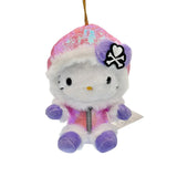 This exclusive Hello Kitty x Tokidoki design is perfect for the holiday season. Hello Kitty sports a trendy look with an iridescent pink holographic beanie adorned with her signature purple bow decorated with a white heart and crossbones skull Tokidoki mark. She's dressed in a stylish pink holographic vinyl puffer jacket. This ornament is perfect collectible, gifting or decorating your home.