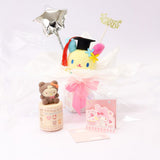 An officially licensed Class of 2026 Sanrio graduation gift set featuring six popular plush characters, Usahana, Corocorokuririn, Wish Me Mell, and Dinguri Days Mashu wearing black graduation caps. The characters are arranged like a bouquet with silver star balloons and "Congrats Grad" decorations.