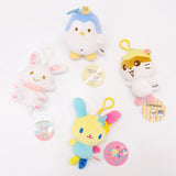 An officially licensed Class of 2026 Sanrio graduation gift set featuring six popular plush characters, Usahana, Corocorokuririn, Wish Me Mell, and Dinguri Days Mashu wearing black graduation caps. The characters are arranged like a bouquet with silver star balloons and "Congrats Grad" decorations.