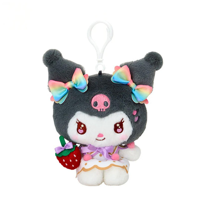 Officially licensed by Sanrio Kuromi dressed in elegant white outfits with gold polka dots and vibrant rainbow bows, this large cast of beloved she is holding a velvet strawberry and features detailed embroidered heart accents in eyes their eyes. Perfect for adding a nautical touch of kawaii style to your bag, keys, or backpack.