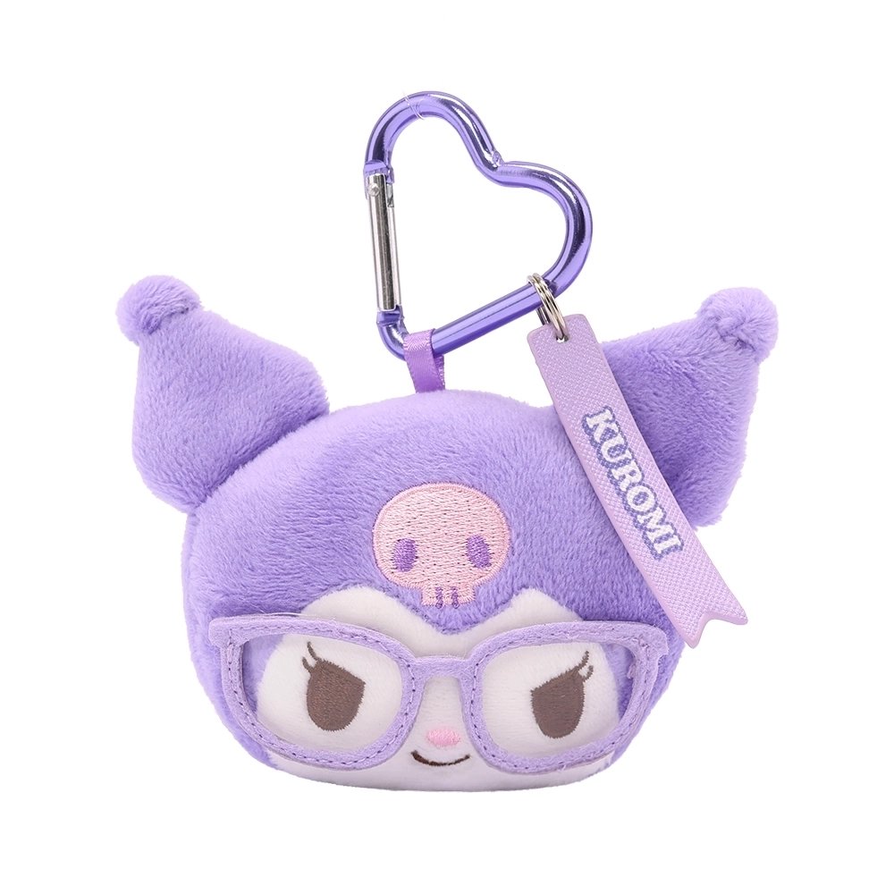 An officially licensed Sanrio Kuromi plush head keychain, wearing embroidered light purple glasses and a has a pink skull icon on her forehead. The keychain features a light purple, heart-shaped metal carabiner clip and a woven fabric tag that reads "KUROMI." The sturdy, heart-shaped carabiner in a matching metallic light purple finish, makes it easy to clip onto backpacks, purses, or belt loops.