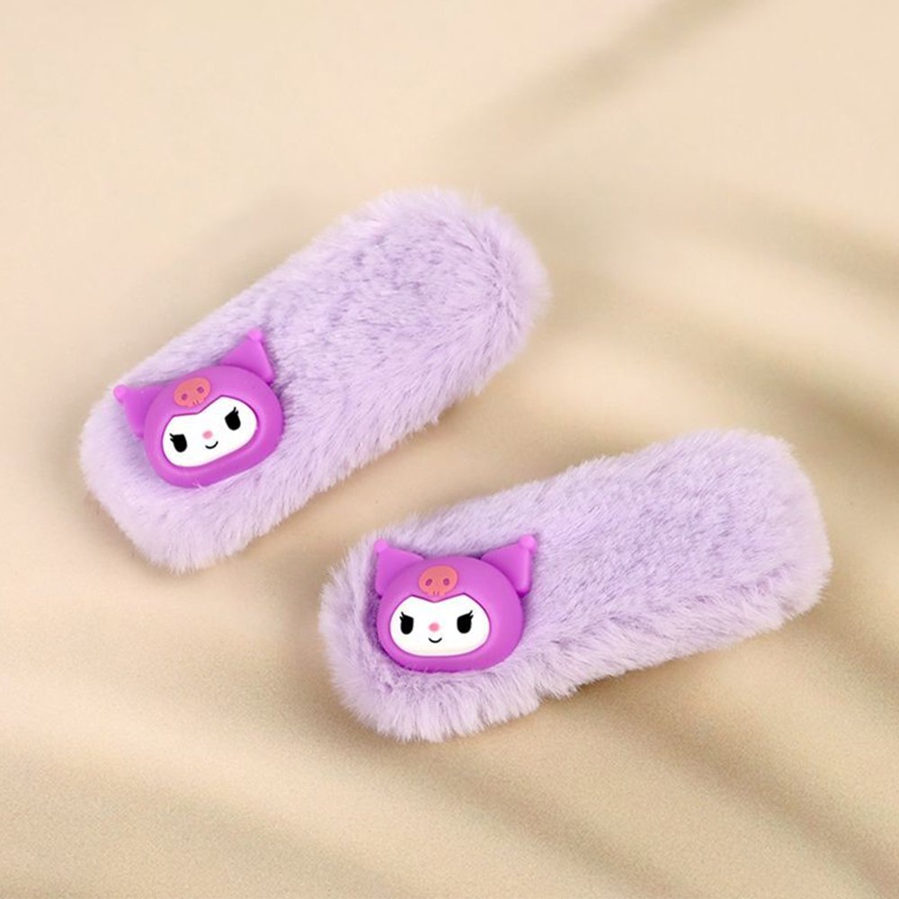 A pair of pastel purple faux fur hair clips featuring 3D Sanrio Kuromi character charms with her signature pink skull on the forehead.