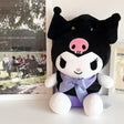 An officially licensed Sanrio Kuromi plush toy dressed in a black graduation cap with a gold tassel and a matching gown featuring a large light purple bow
