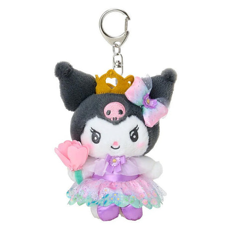 A plush keychain of the Sanrio character Kuromi dressed as a princess. She has grey fur, a pink skull on her forehead, and wears a golden crown. Her outfit includes a purple satin dress with a floral organza overlay and a rainbow-gradient bow with a purple flower. She is holding a pink flower and is attached to a silver lobster clasp.