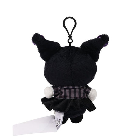 Officially licensed Kuromi bag clip  plush doll wearing a in a school uniform. She wears a black and white plaid school uniform dress with a black velvet pleated skirt.  Perfect size to attach to your backpack, bag, purse, car, or pants. Ideal collectible toy for fans and Sanrio enthusiasts.