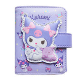 An officially licensed Sanrio collection of tri-fold wallet in purple featuring large 3D padded appliqués of Kuromi