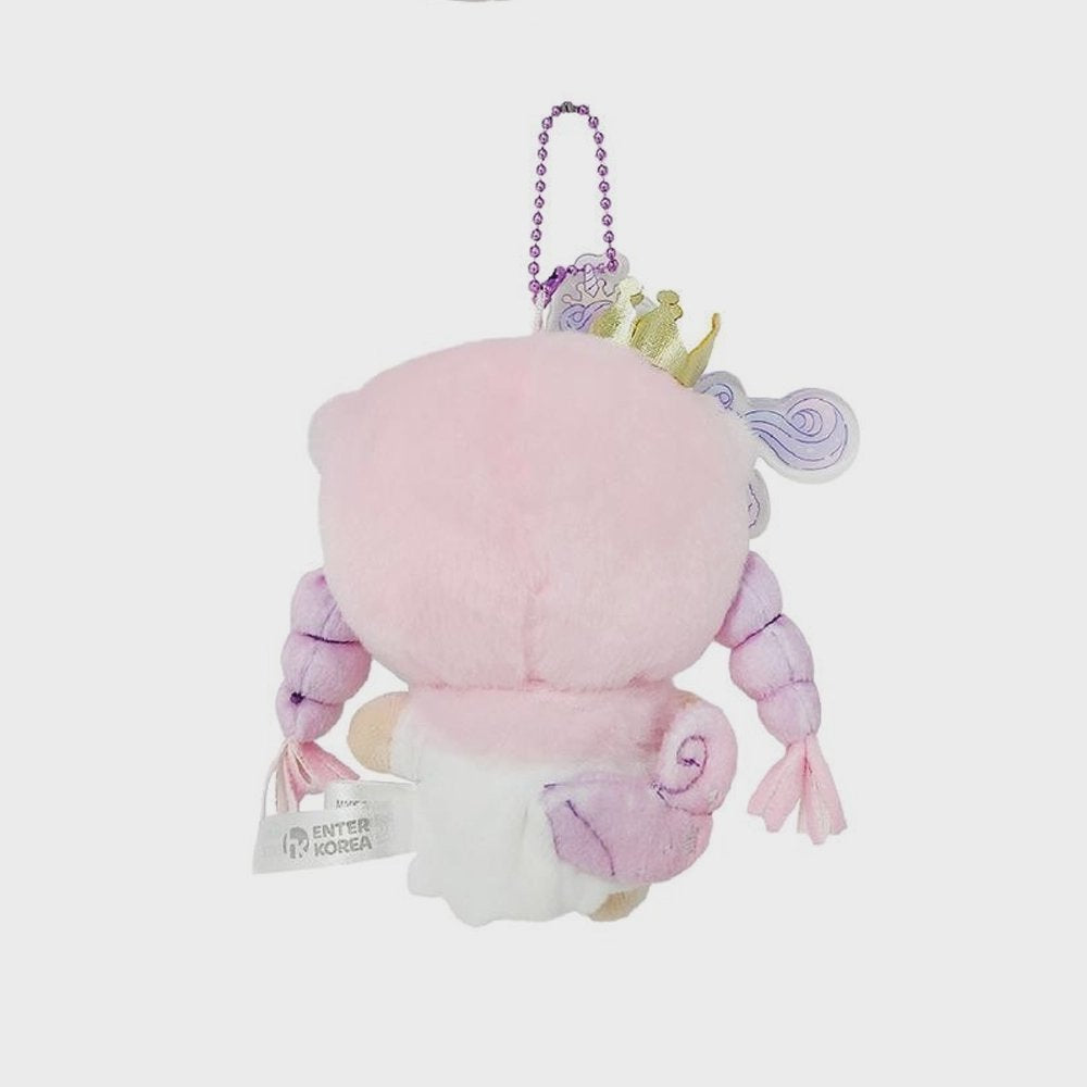 An officially licensed Sanrio Lala Little Twin Stars plush keychain wearing a pink unicorn hood with a gold crown and horn. The plush has long pink braids, a star-shaped bow, and is attached to a purple ball chain with a unicorn acrylic charm.