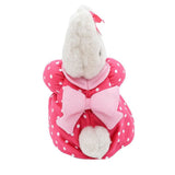 Pink polka dot Sanrio Marron Cream coat with a large bow on a white background