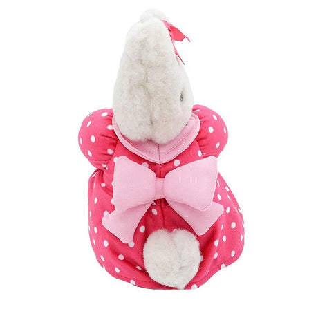 Pink polka dot Sanrio Marron Cream coat with a large bow on a white background