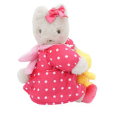 Sanrio Marron Cream a pink dress with white polka dots on a white background
