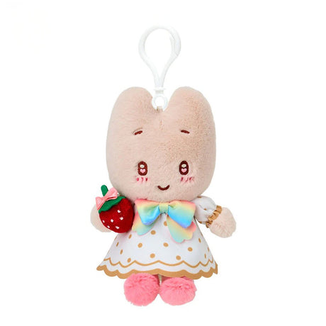 Officially licensed by Sanrio Marroncream dressed in elegant white outfits with gold polka dots and vibrant rainbow bows, this large cast of beloved she is holding a velvet strawberry and features detailed embroidered heart accents in eyes their eyes. Perfect for adding a nautical touch of kawaii style to your bag, keys, or backpack.