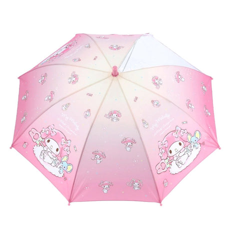 Pink Sanrio My Melody kids' umbrella featuring a pink gradient canopy with one clear see-through safety panel, finished with a 3D My Melody J-handle.