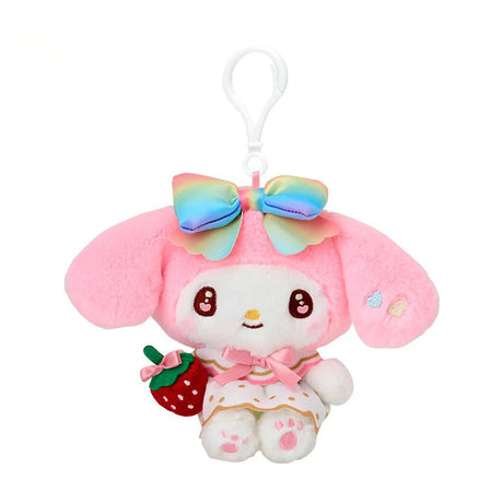 Officially licensed by Sanrio My Melody dressed in elegant white outfits with gold polka dots and vibrant rainbow bows, this large cast of beloved she is holding a velvet strawberry and features detailed embroidered heart accents in eyes their eyes. Perfect for adding a nautical touch of kawaii style to your bag, keys, or backpack.