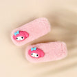 A pair of pastel pink faux fur hair clips featuring 3D Sanrio My Melody character charms with blue bows.
