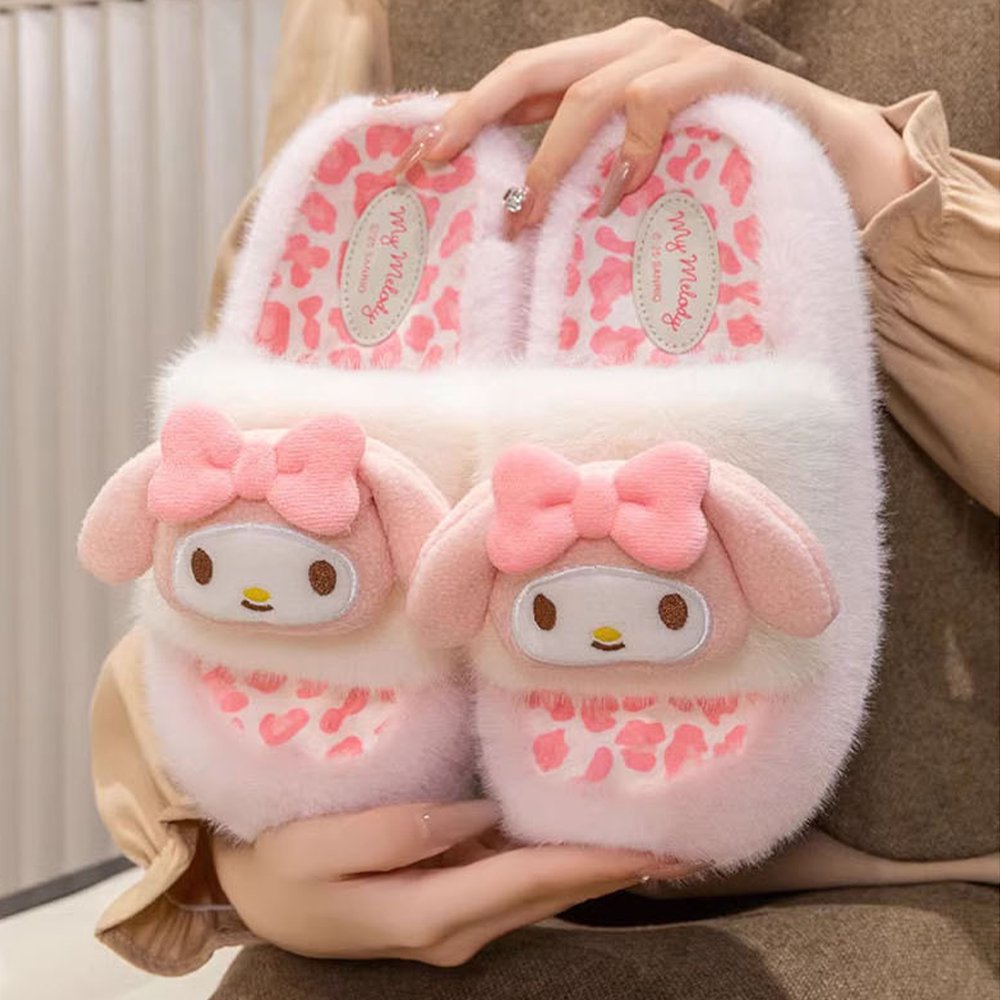 A pair of officially licensed Sanrio My Melody plush slippers featuring soft pink and white faux fur, a leopard print footbed, and a 3D plush My Melody face with pink bows on top.