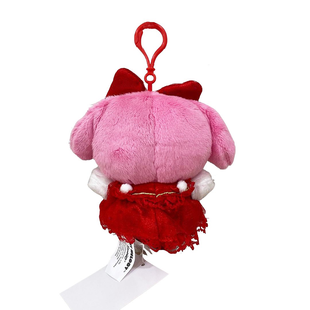 Officially licensed by My Melody Plush keychain in a red dress with white accent pompom on a white background. she’s perfect for cuddling, displaying, or gifting Christmas to Sanrio fans of all ages.