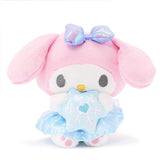 Magical My Melody Snow Angel plush sitting on soft clouds against a light blue background, creating a serene winter scene