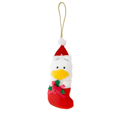 Sanrio Pekkle is dressed for the season wearing a red Santa hat with a white pom-pom while sporting his signature red bow. He sits snugly in a red Christmas stocking adorned with green holly leaves and a decorative ribbon. Crafted from soft plush material, this ornament has a cozy, huggable feel. The attached gold cord loop makes it easy to hang on your Christmas tree.