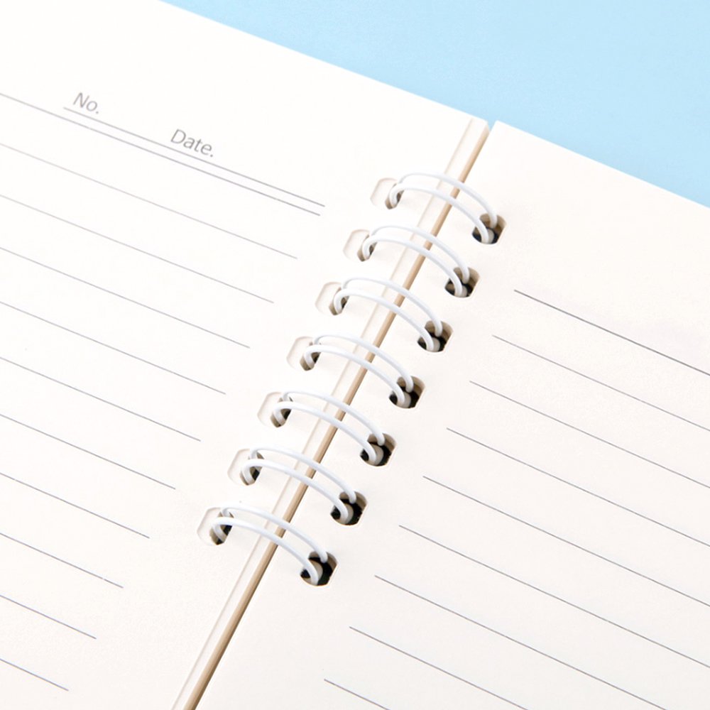 A soft yellow, officially licensed Pochacco spiral lined notebook featuring Pochacco celebrating next to a cake and the little friends.