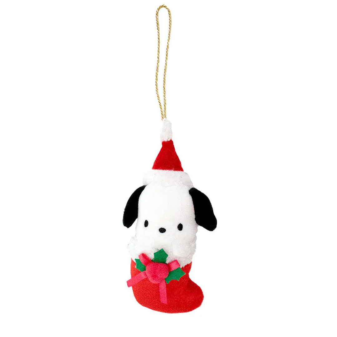 Sanrio Pochacco is dressed for the season wearing a red Santa hat with a white pom-pom while sporting his signature red bow. He sits snugly in a red Christmas stocking adorned with green holly leaves and a decorative ribbon. Crafted from soft plush material, this ornament has a cozy, huggable feel. The attached gold cord loop makes it easy to hang on your Christmas tree.