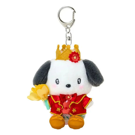 Sanrio Pochacco plush keychain dressed as a prince in a red and gold royal suit with a matching crown, holding a yellow fabric tulip, attached to a silver metal lobster clasp.