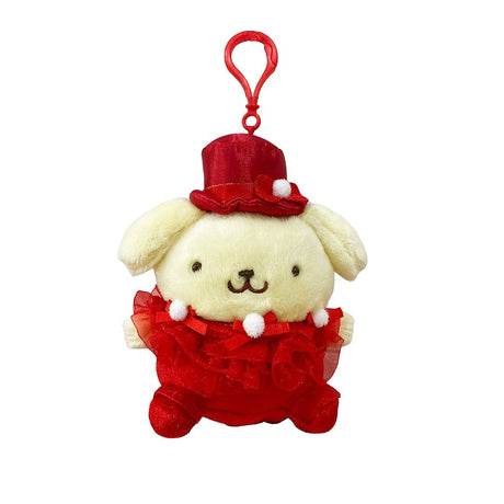 Officially licensed by Pompompurin Plush keychain in a red dress with hat on a white background. He’s perfect for ornament , displaying, or gifting Christmas to Sanrio fans of all ages.
