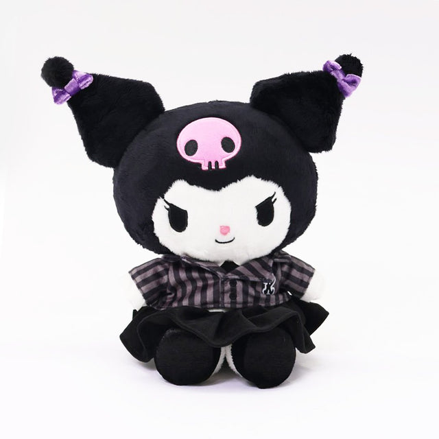 Officially licensed Sanrio Kuromi plush doll, wearing a black and white plaid school uniform dress with a black velvet pleated skirt. Kuromi's signature pink skull is embroidered on her black head. 