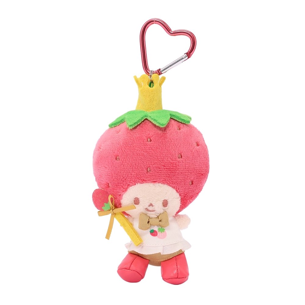 Officially licensed Sanrio Strawberry King plush keychain from the Strawberry News 50th Anniversary Series. The plush wears a signature look features a massive red strawberry head with embroidered "seeds" and a green leafy base, with a metallic pink heart-shaped carabiner. Perfect displaying, bag decoration or gifting Valentine's day gift to Sanrio fans of all ages.