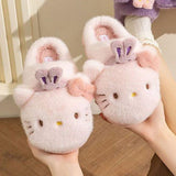 Sanrio officially licensed Hello Kitty Bunny Head Fur Slippers for children. Features include a fluffy pink exterior, iconic Hello Kitty face with bunny ears, and a soft, warm lining perfect for home lounging.
