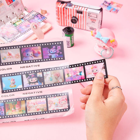 An officially licensed Sanrio Netflix series My Melody & Kuromi film strip stickers in a vintage-style 35mm film negative.