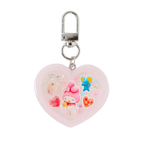 Officially licensed Sanrio handmade heart-shaped water shaker keychains in pastel pink featuring My Melody and pastel purple featuring Kuromi